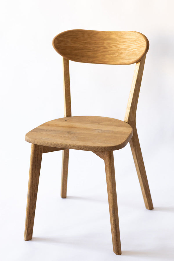 Set van 2 of 4 massief eiken eetkamerstoelen Isku | NordicStory