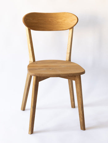 Set van 2 of 4 massief eiken eetkamerstoelen Isku | NordicStory