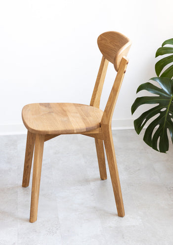 Set van 2 of 4 massief eiken eetkamerstoelen Isku | NordicStory