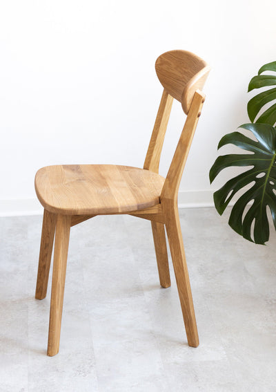 Set van 2 of 4 massief eiken eetkamerstoelen Isku | NordicStory