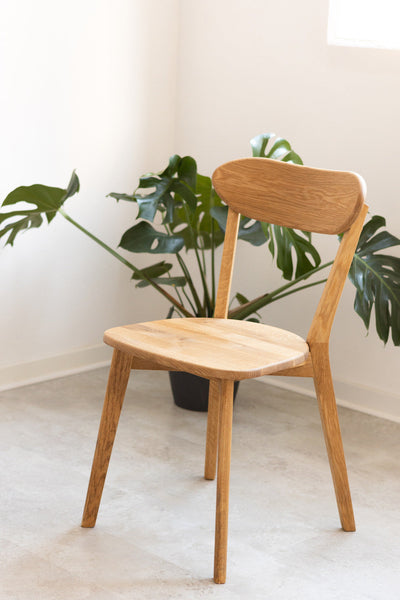 Set van 2 of 4 massief eiken eetkamerstoelen Isku | NordicStory