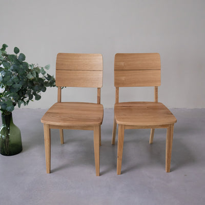 NordicStory Set massief eiken eetkamerstoelen uit de Mauritz collectie Scandinavisch meubilair met een modern eikenhouten ontwerp.