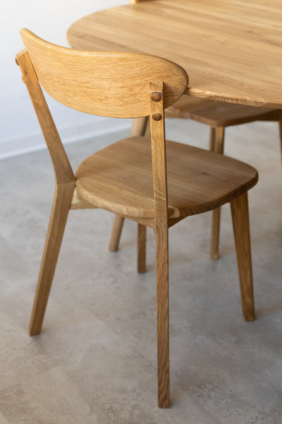 Set van 2 of 4 massief eiken eetkamerstoelen Isku | NordicStory